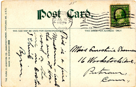 Postcard with handwritten address and message in fancy script