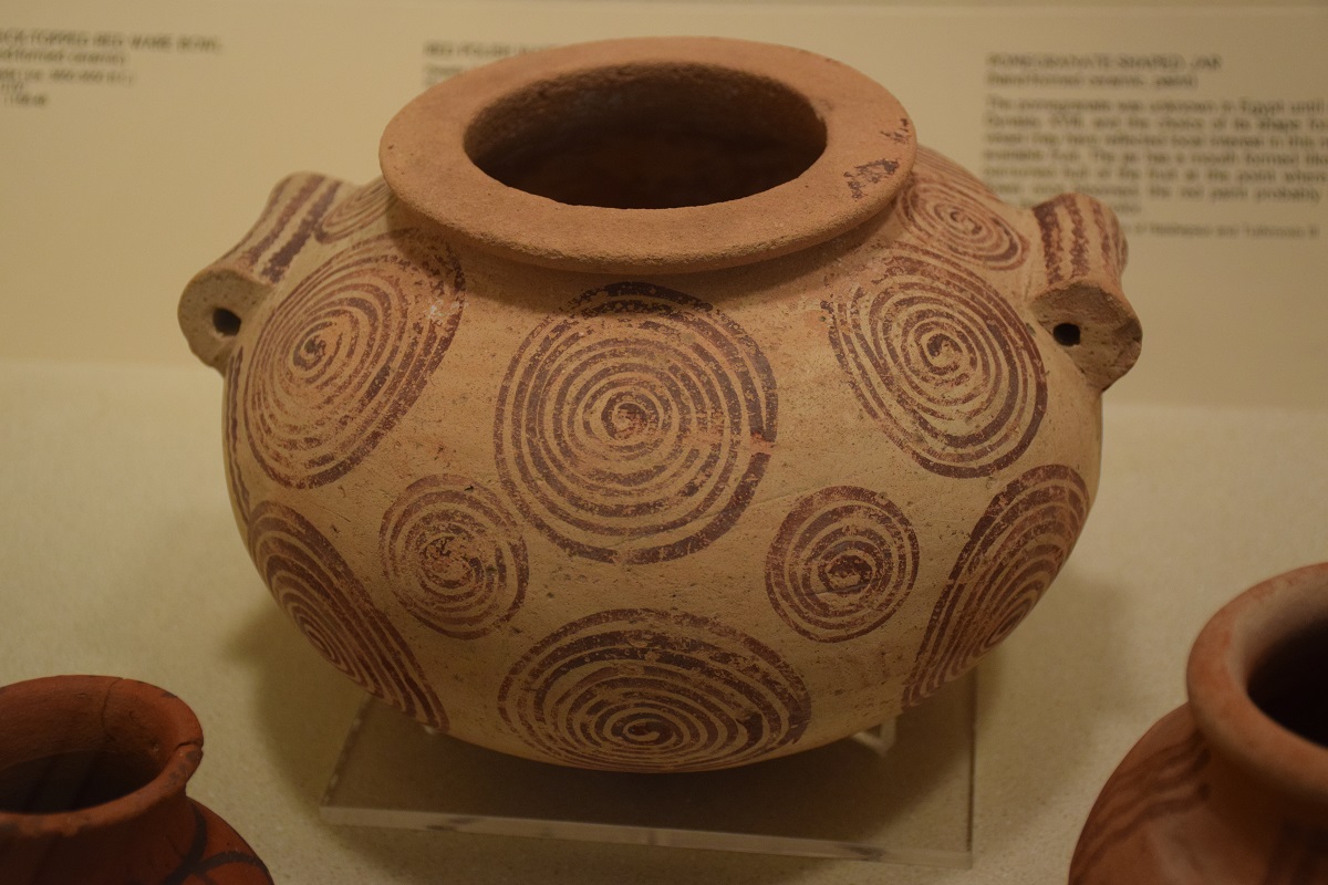Ancient jar with circular decorations