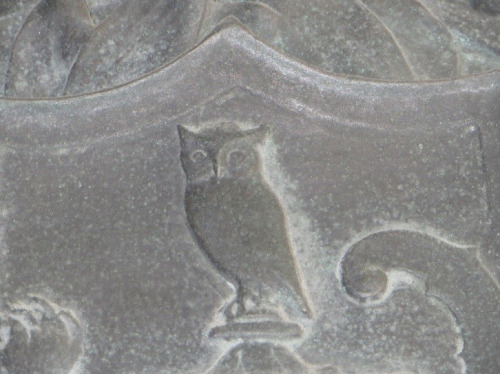 Owl engraving on a metal door