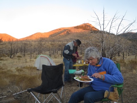 paleontologists eating at campsite