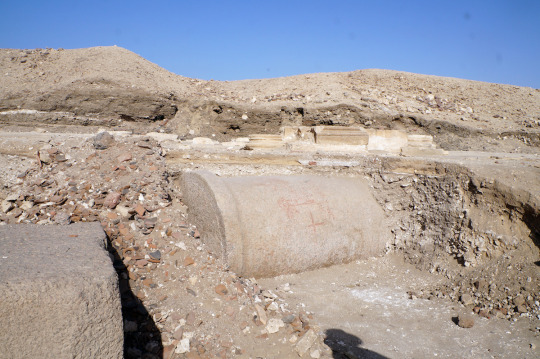 Ancient columns being excavated in an archeology dig