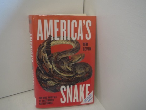 red book cover for a book title "America's Snake" by Ted Levin