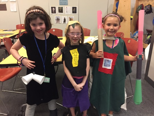 three campers dressed up in costumes that they made