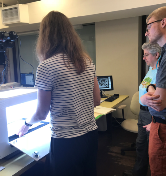 Anne Barber training Botany staff Mason Heberling and Bonnie Isaac to use the new imaging station