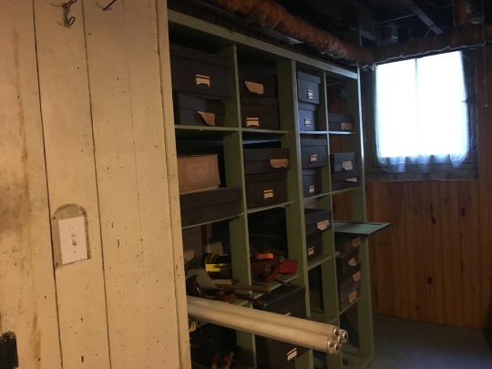 Herbarium space built in the basement of Charles Boardman’s house with boxes of specimens.
