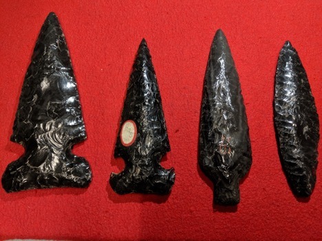 four obsidian artifacts