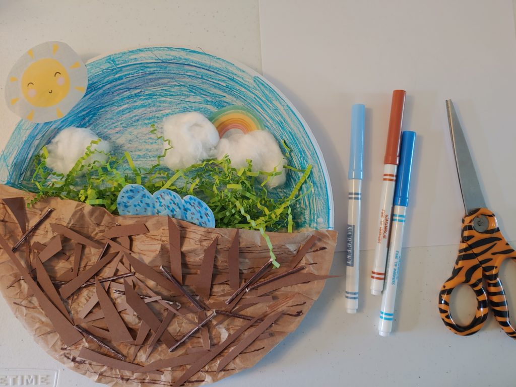 bird nest craft complete with grass "nest" and colored eggs added