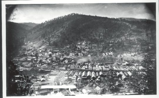 black and white photo of Deadwood from a distance