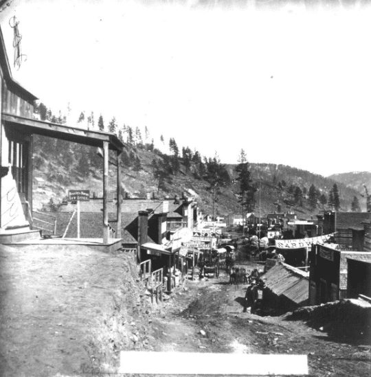 black and white photo of a Deadwood street