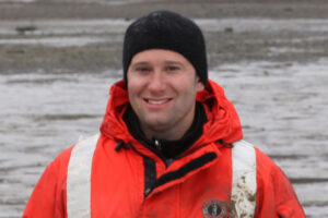 Matt Lamanna posing for a photo in Antarctica