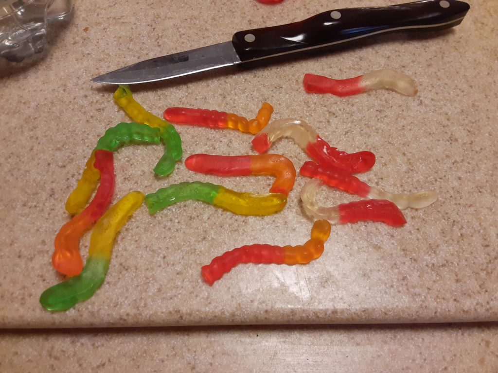 gummy worms cut in half
