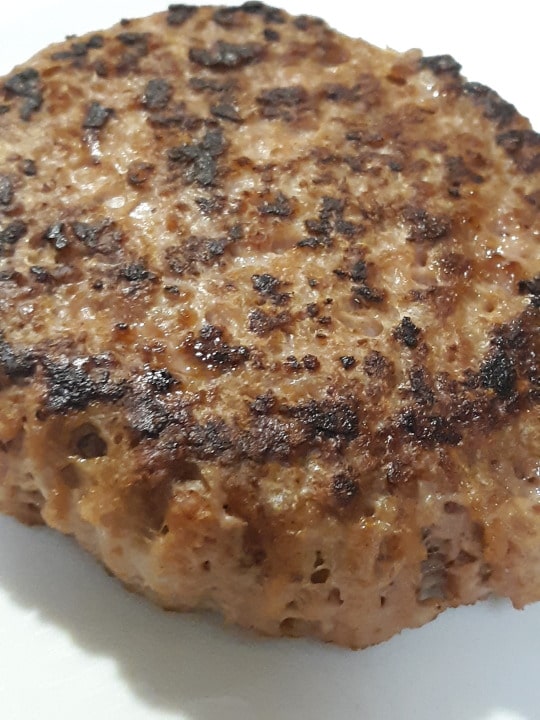 close up of burger patty