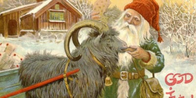 Santa feeding a yule goat