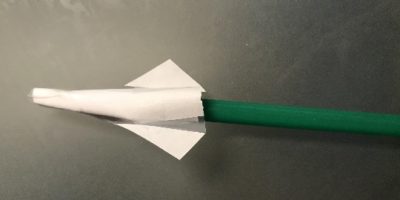 paper rocket on a straw
