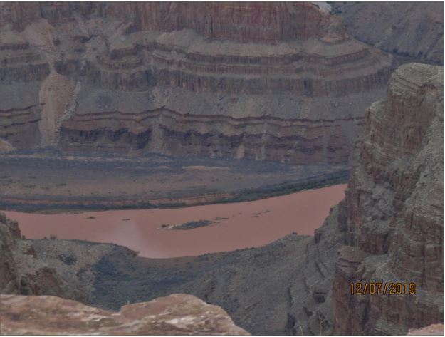 River running through a canyon with a date stamp of 12/07/2019 in the lower right corner. 