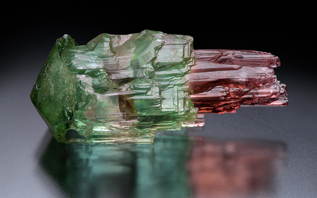 A green and purple crystal