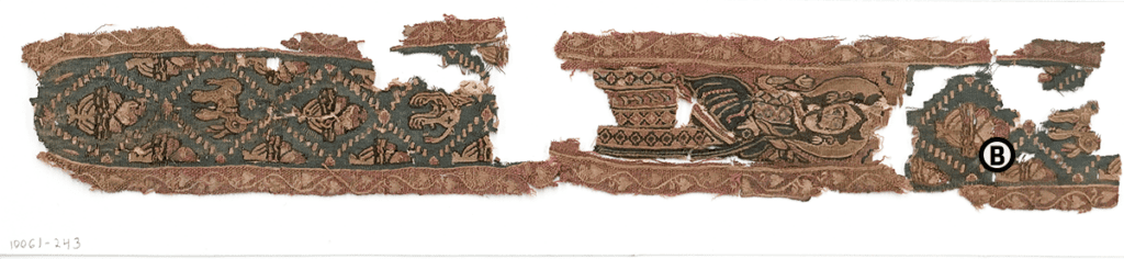 Full textile fragment with notation.