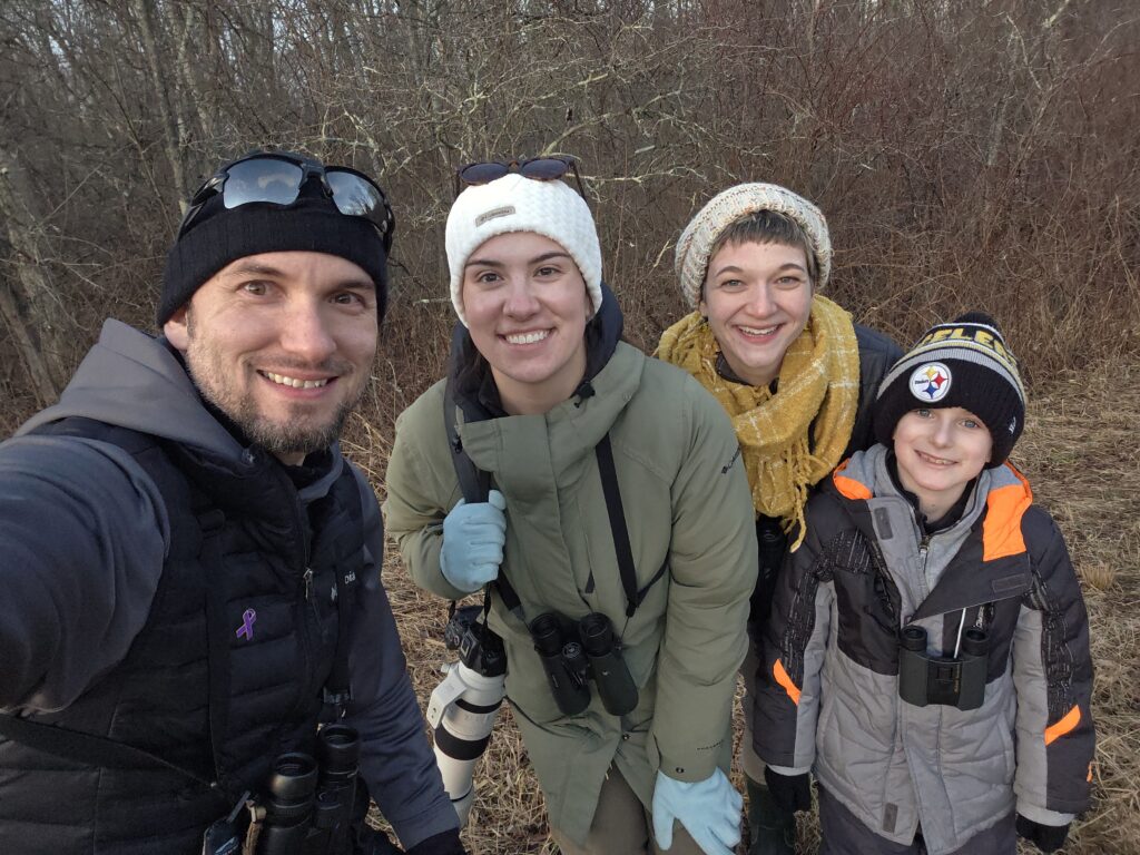 group of people taking a selfie outdoors in winter
